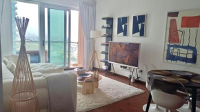 1BR Golf, Pool & Lake Views at The Fairways West Tower